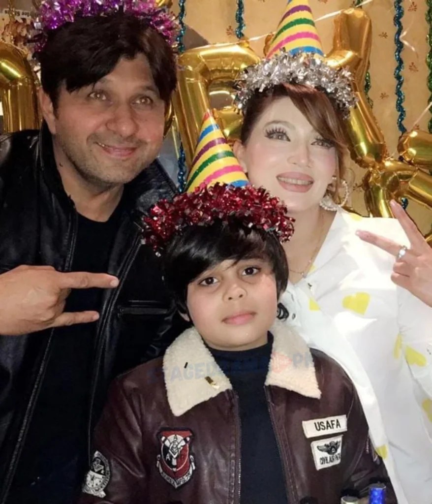 khushboo khan with husband and younger son